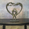 Sitting Couple Under Heart Tree