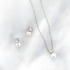 Dainty Pearl and Crystal necklace and earring set