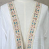 Kaftan with fluted sleeves and pastel embroidery detail and tie